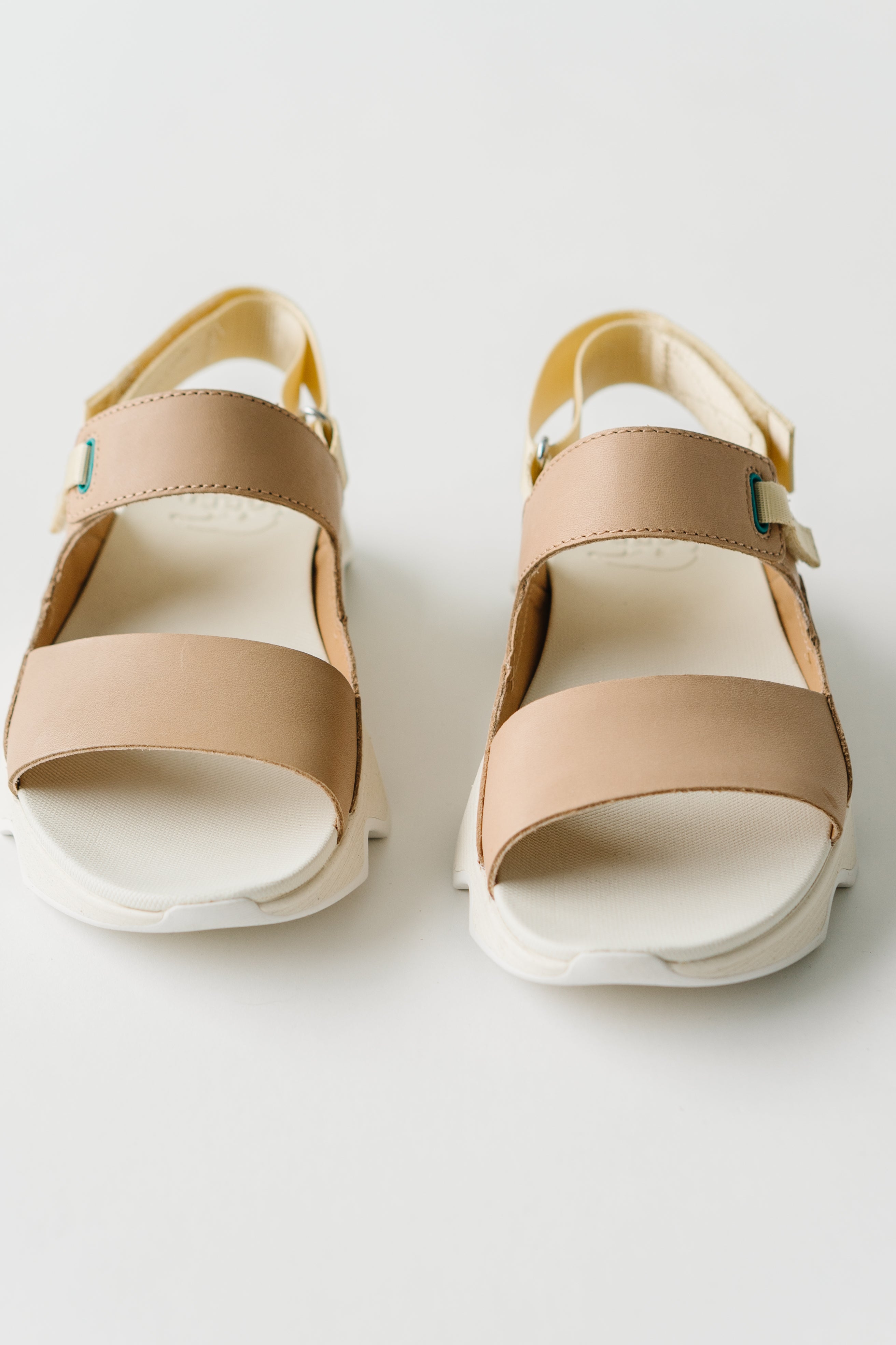 SOREL: Kinetic Impact II Sling Low Sandal in Honest Beige + Sea Salt